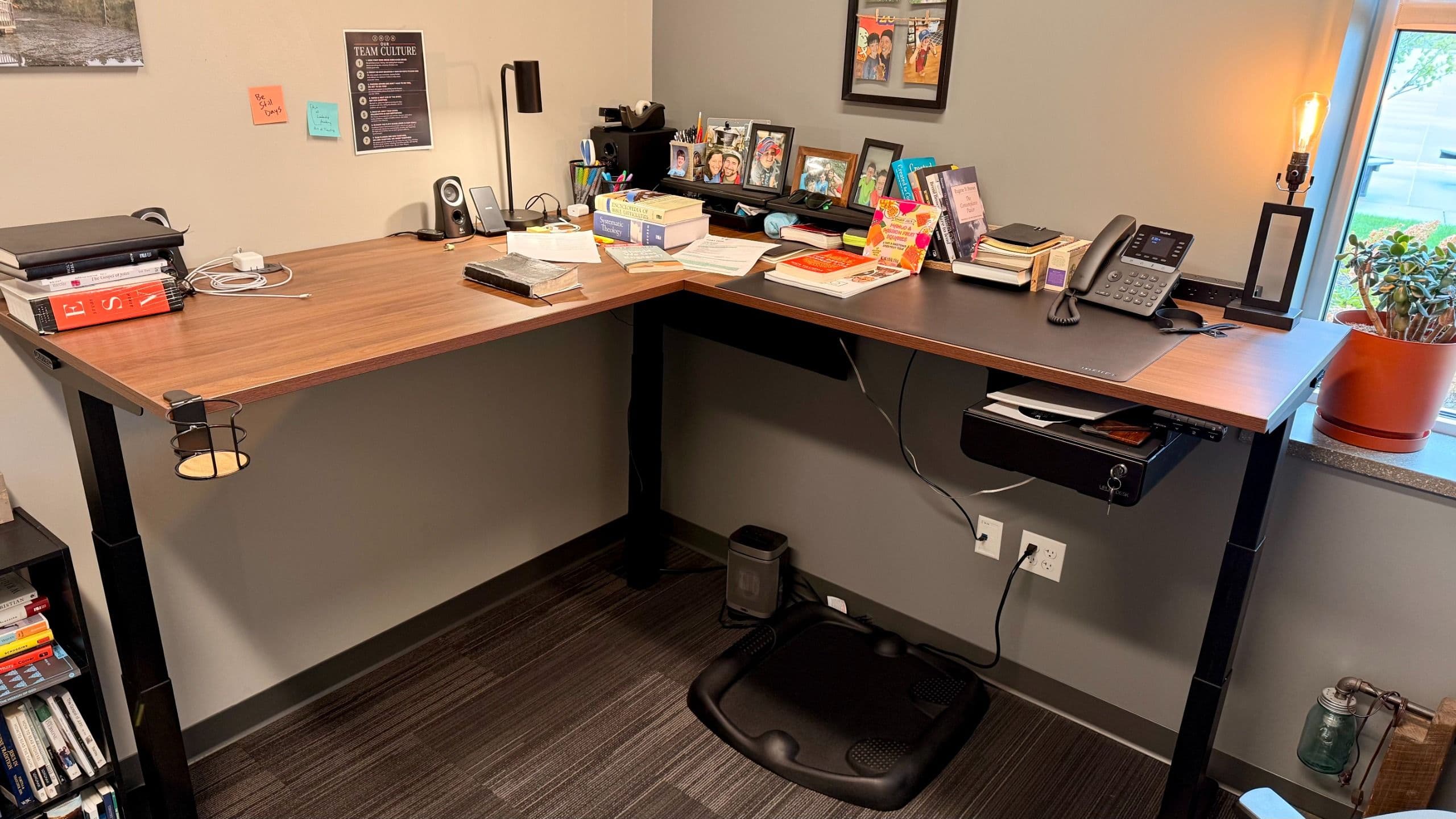 Uplift's L-shaped standing desk is beautifully built for a workstation setup